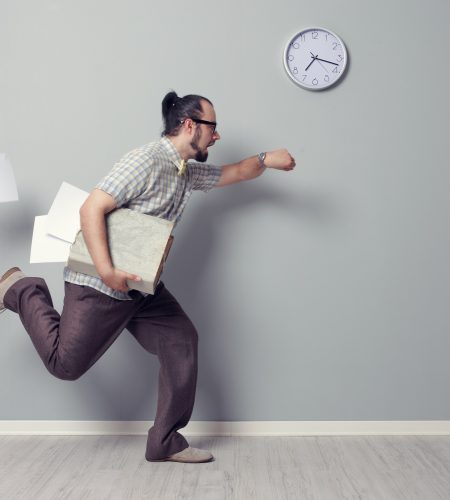 Stressed business man rushing in the office